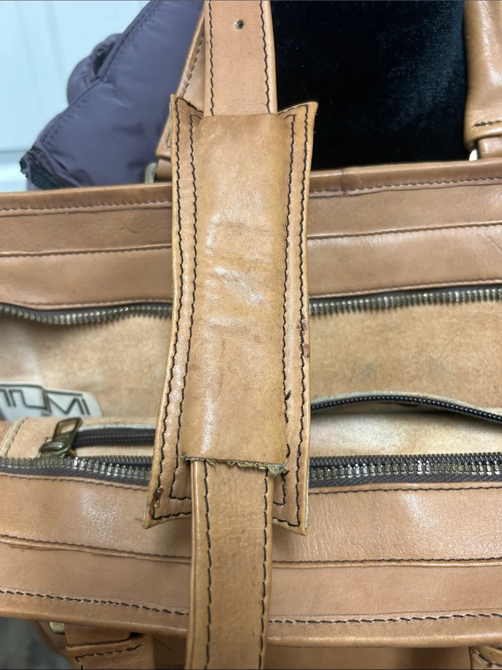 Tumi beautiful leather